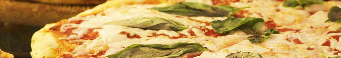 Eating Italian Pizza Sandwich at Italian Kitchen restaurant in Raleigh, NC.